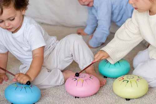 Baby Tambú Csilingelő rózsaszín gyerekhangszer, zenedob, handpan